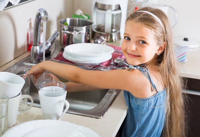 Child Washing Dishes